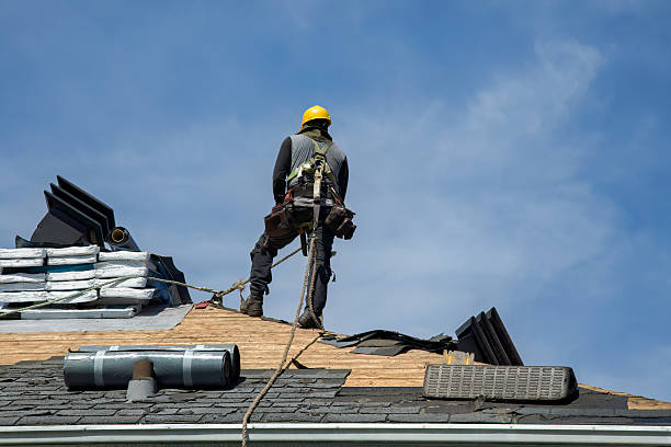 Professional Roof Replacement technician working in Marion, KS
